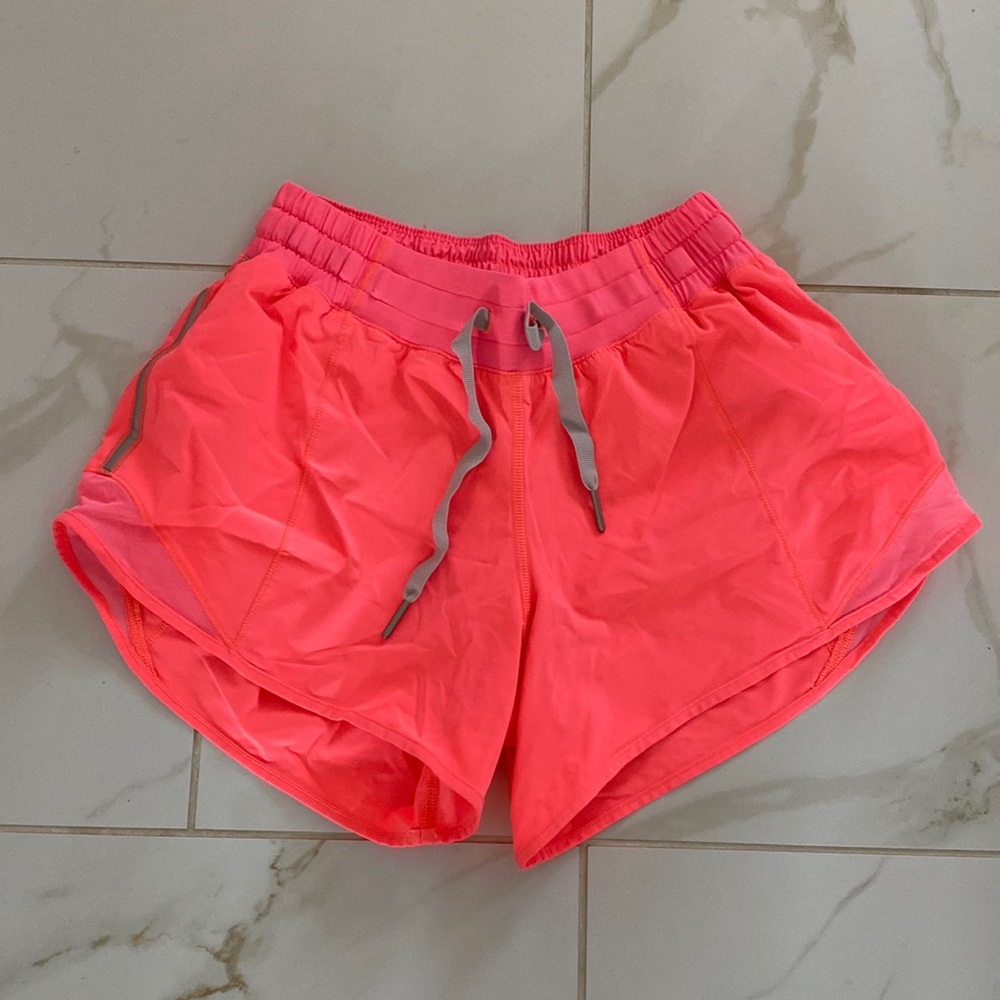 Sz 4 Lululemon Hotty Hot long neon coral orange shorts